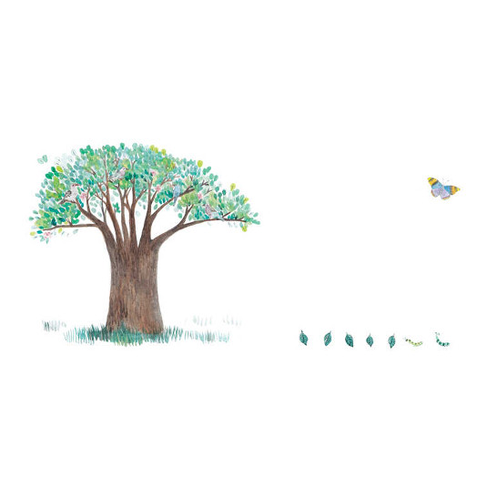 A butterfly flying near a beautiful tree.