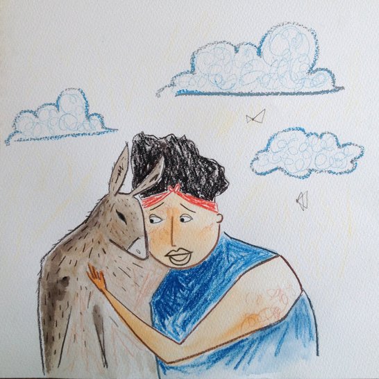 A woman hugging a donkey.